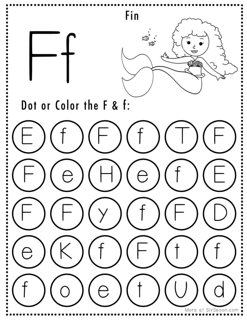 A child drawing a colorful fish next to the letter F