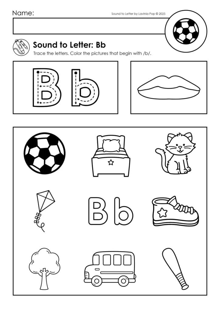 A kindergartner carefully tracing letters on a winter-themed worksheet with crayons
