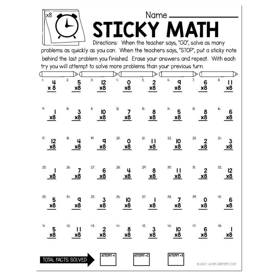 A child focused on writing numbers carefully on a math practice sheet