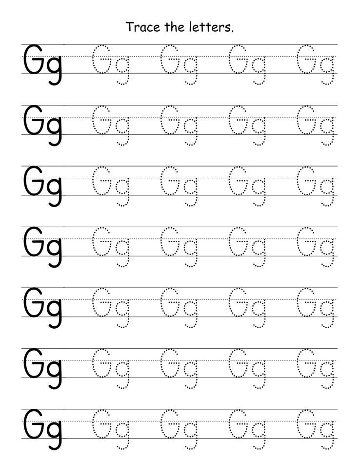 Close up of colorful counting blocks placed on a worksheet next to written numbers.