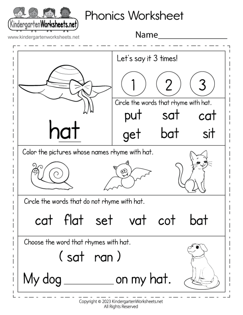 Close up of a child using colorful markers on a phonics activity page