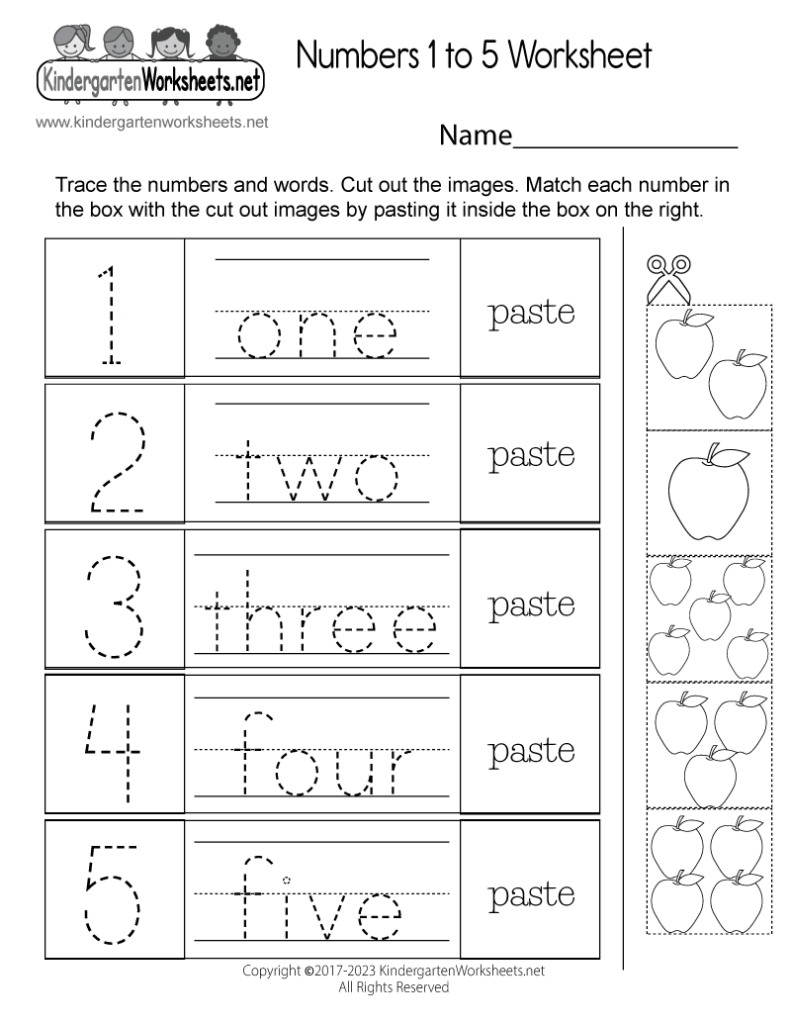 Close up of a child using plastic counting cubes on a worksheet